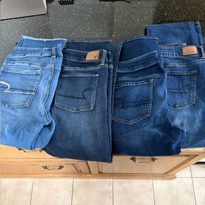 American Eagle Outfitters Dark and Light Blue Women's Jeans. 4 PAIRS